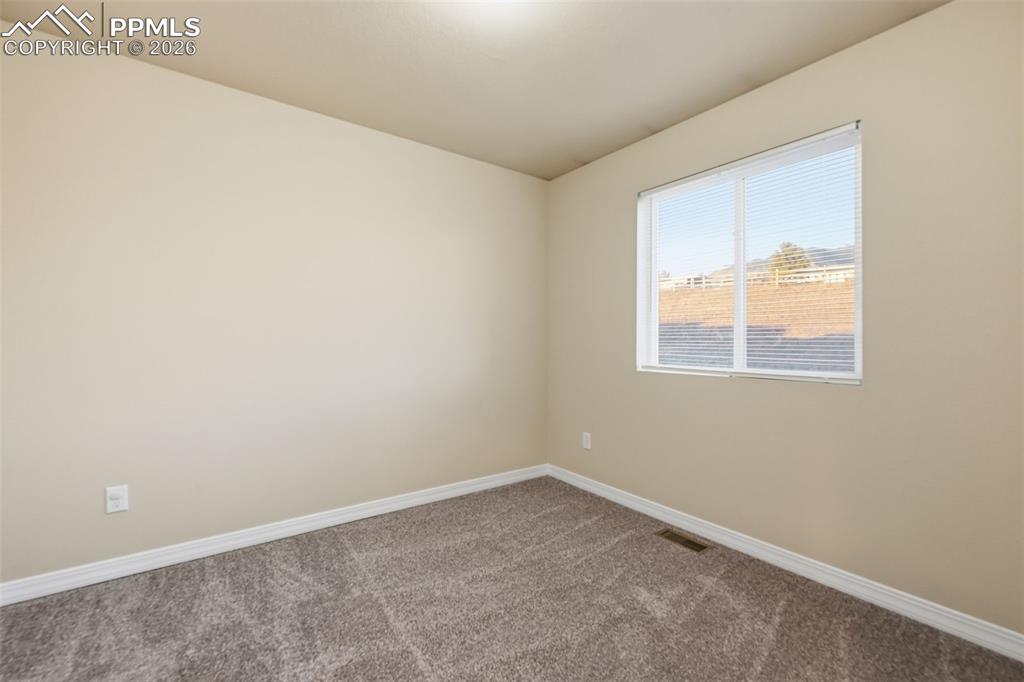 Image 24 of 30: Bedroom