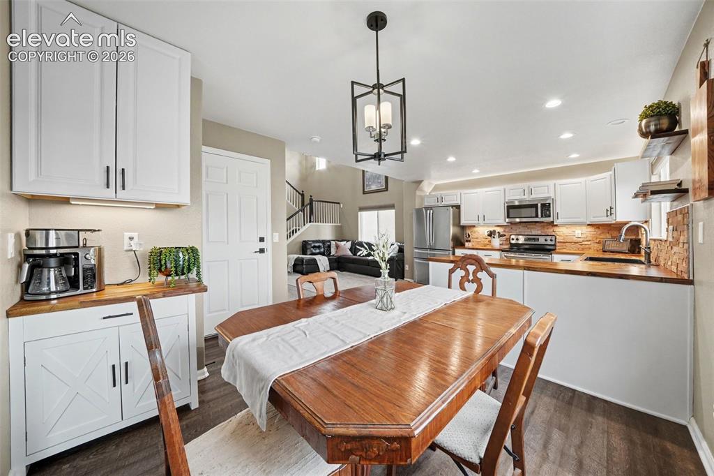 Image 9 of 34: Dining area with coffee bar
