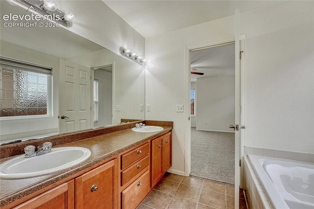 Image 17 of 36: Primary bathroom.