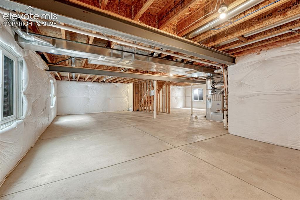 Image 29 of 36: Make this unfinished basement your own!