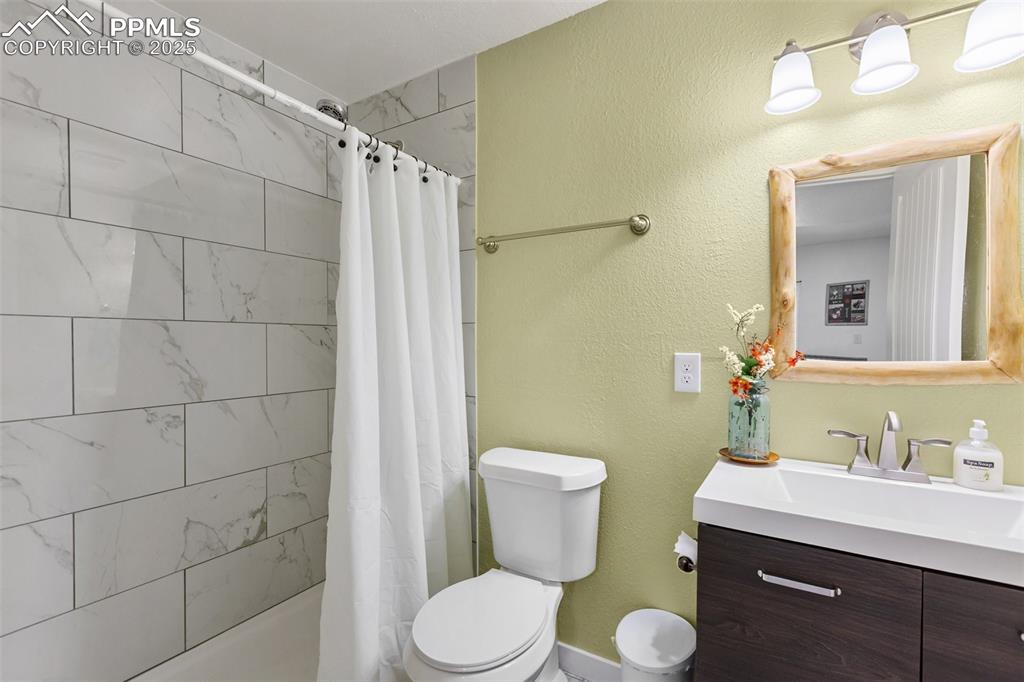 Image 39 of 44: Basement 3/4 bath.