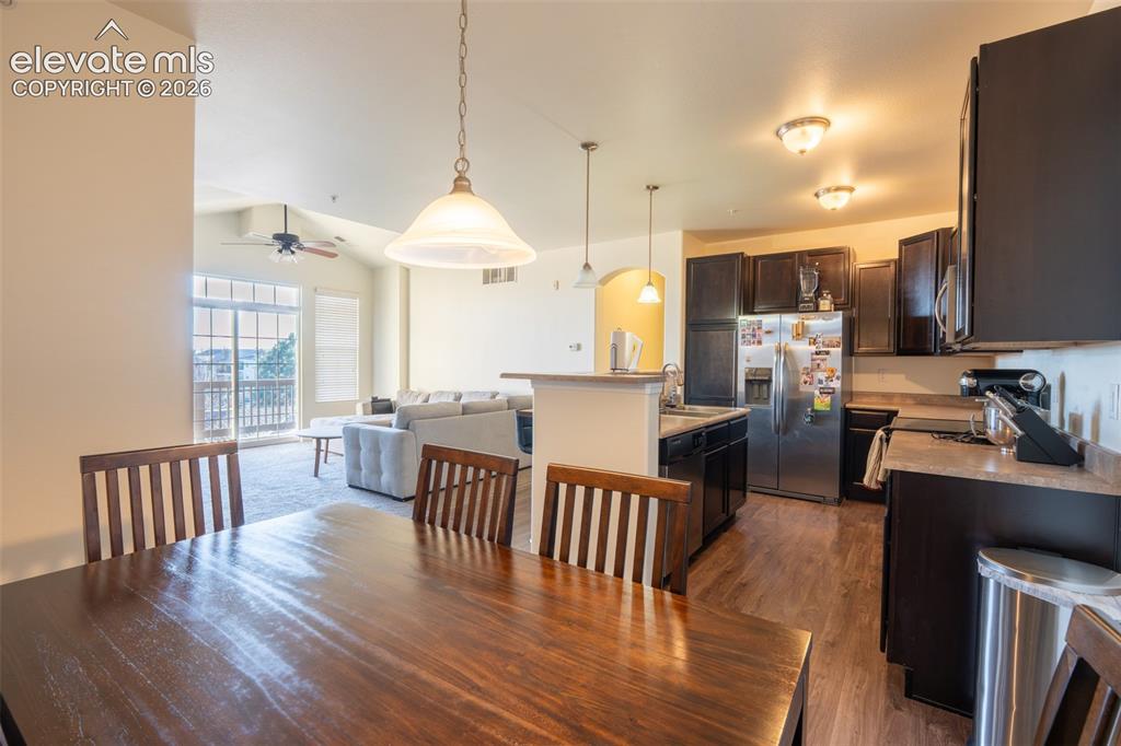 Image 12 of 26: Dining area - kitchen - living room