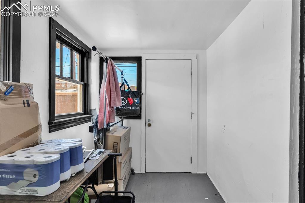 Image 13 of 50: Lower level, Unit B - Rear Entrance