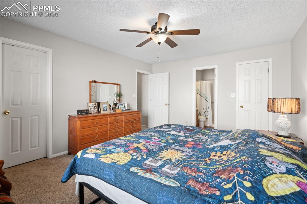 Image 10 of 27: Another view of the primary suite with TWO walk-in closets!