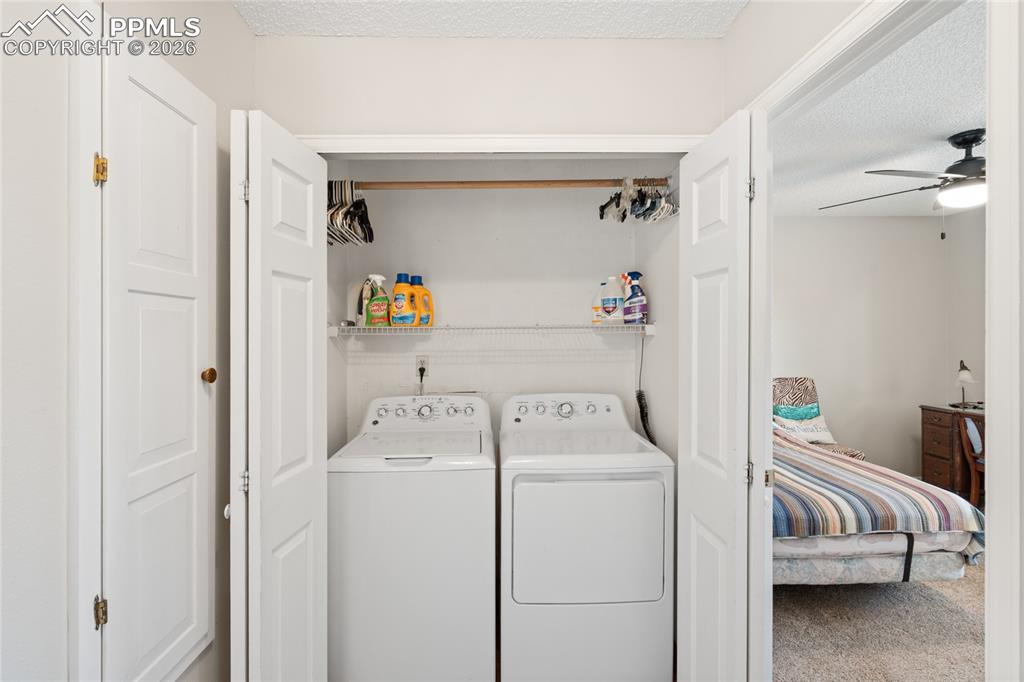 Image 12 of 27: Washer and dryer included, with built in ironing board! Convenient location