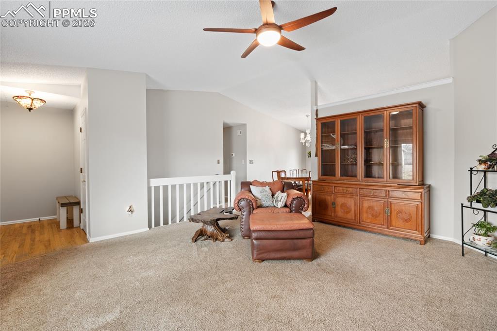 Image 2 of 27: Open living room with new fixtures.