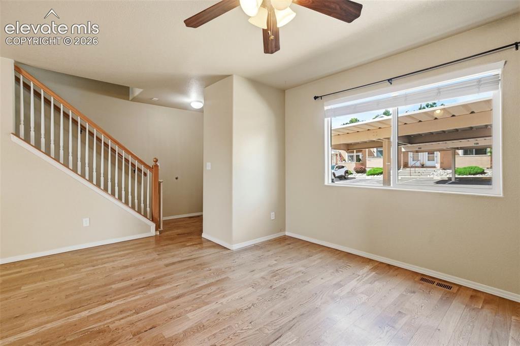 Image 18 of 48: Stairs to 2 Upper Level "Primary" suites