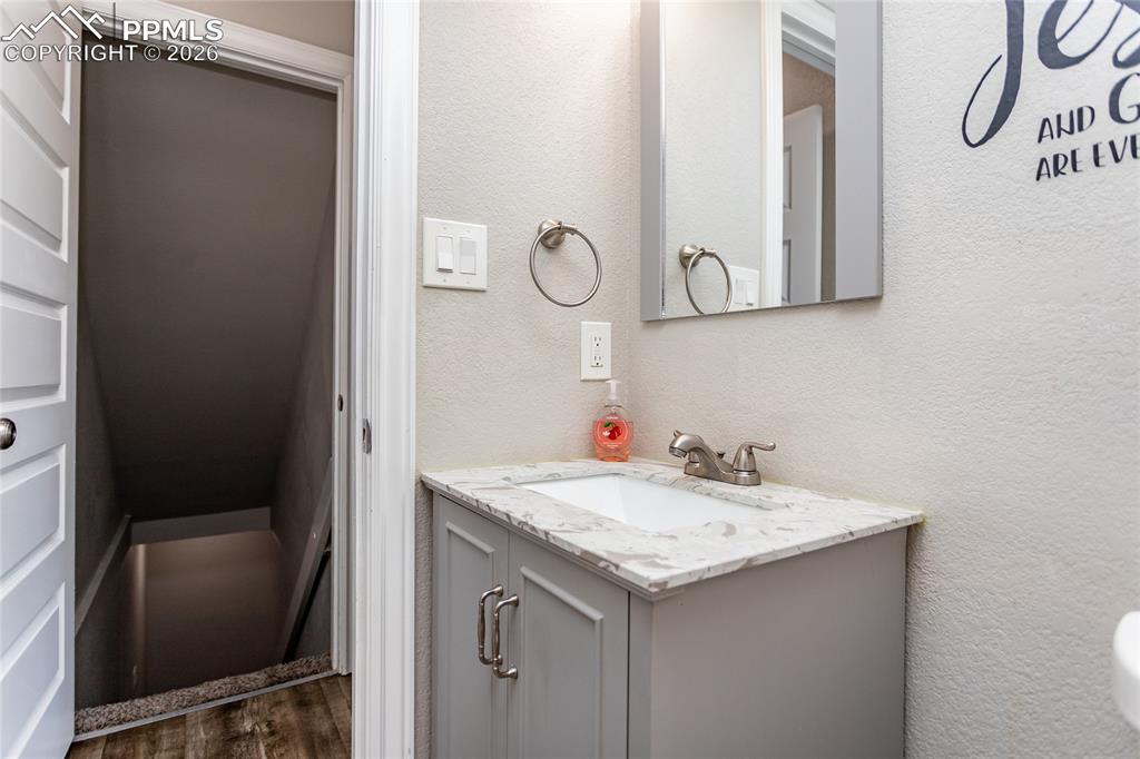 Image 16 of 32: Half bathroom is located on the main level