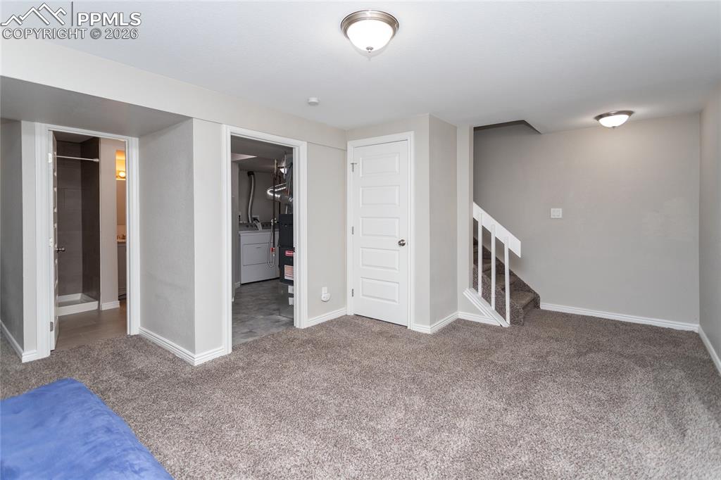 Image 27 of 32: Large third bedroom is located on the basement level