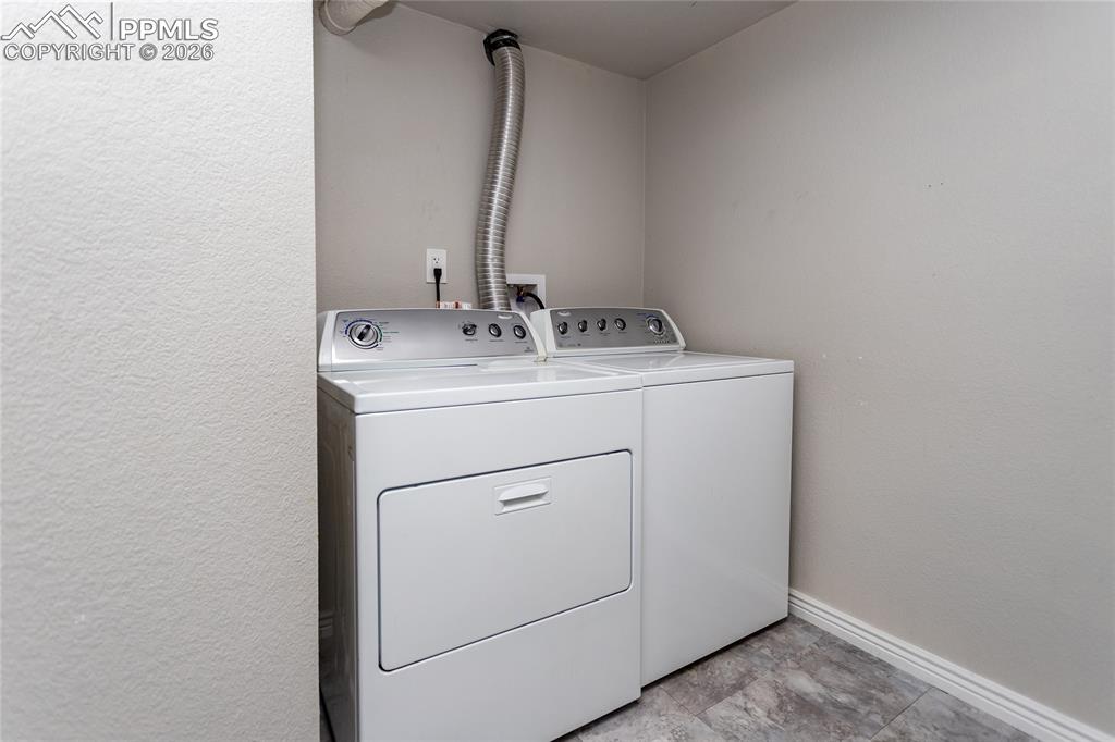 Image 32 of 32: Laundry room is on basement level. Washer & dryer are included in the sale.