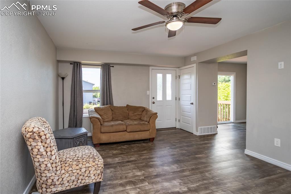 Image 8 of 32: Living Room with coat closet