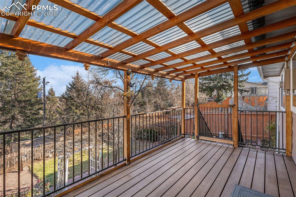 Image 17 of 26: INCREDIBLE TREX COVERED DECK with Access to And Overlooking Your Private Ga