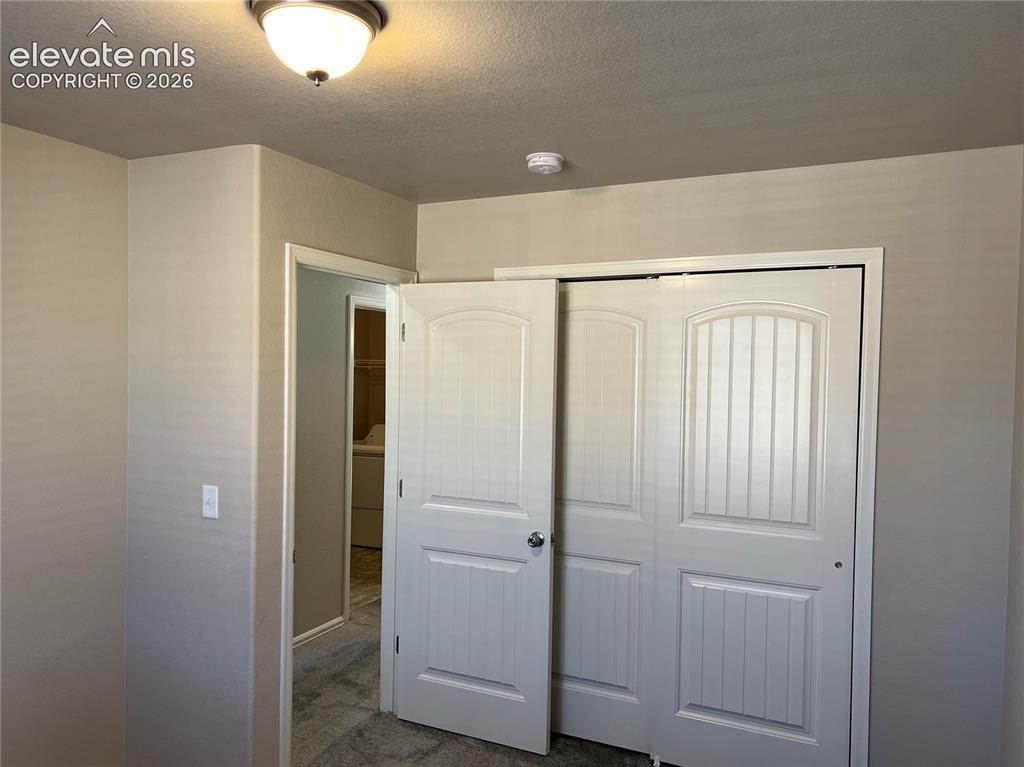 Image 15 of 27: Bedroom