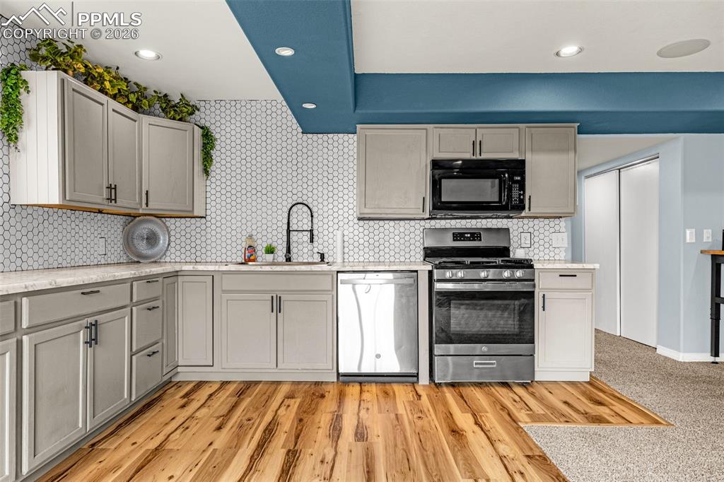 Image 25 of 44: Second kitchen in basement