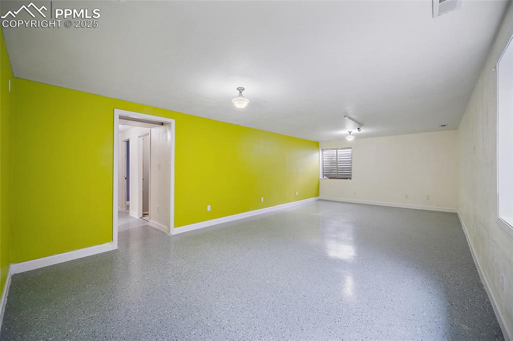 Image 41 of 50: Unfurnished room with baseboards