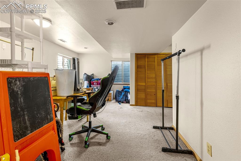 Image 20 of 33: View of carpeted office space