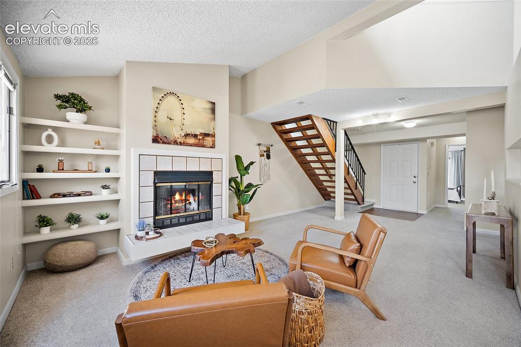 Image 10 of 42: View of living room from dining area