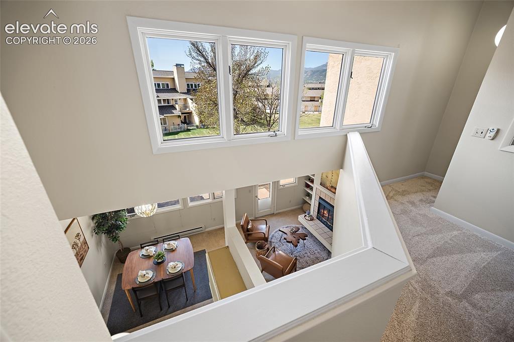 Image 30 of 42: Inviting open concept view from loft 