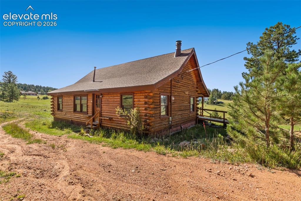 Caption: Colorado log home situated on 2 acres in Colorado Mountain Estates.