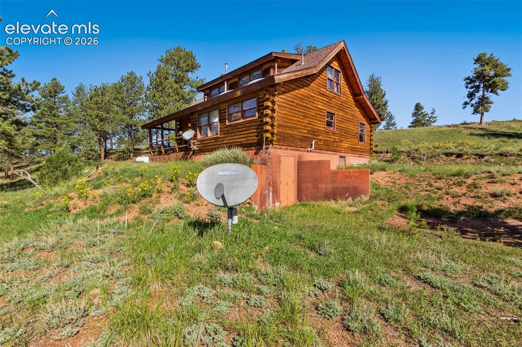 Image 29 of 32: View of the log home