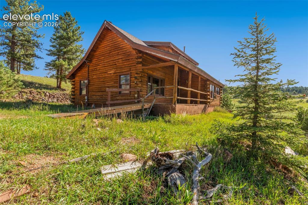 Image 31 of 32: Another look across the property and surrounding Florissant mountain landsc