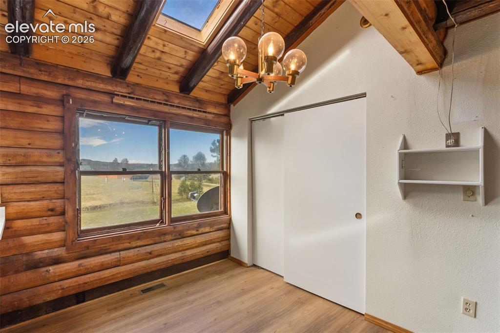 Image 8 of 32: Dining showing pantry cabinetry.