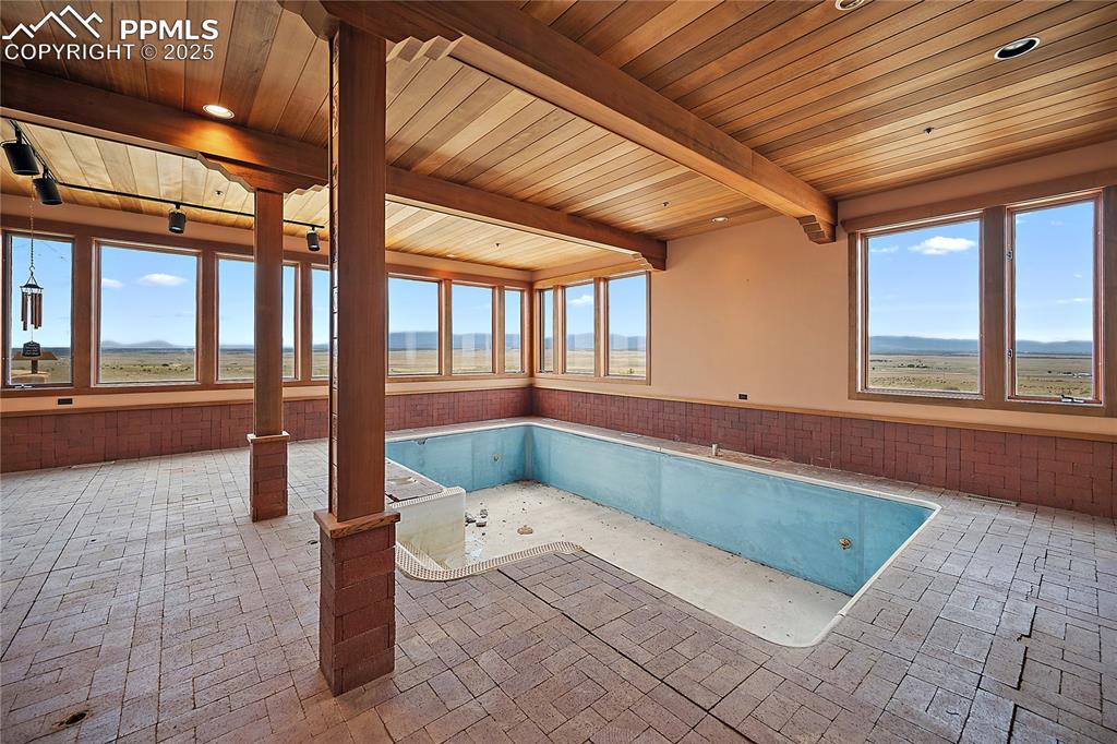 Image 7 of 31: View of swimming pool featuring a mountain view