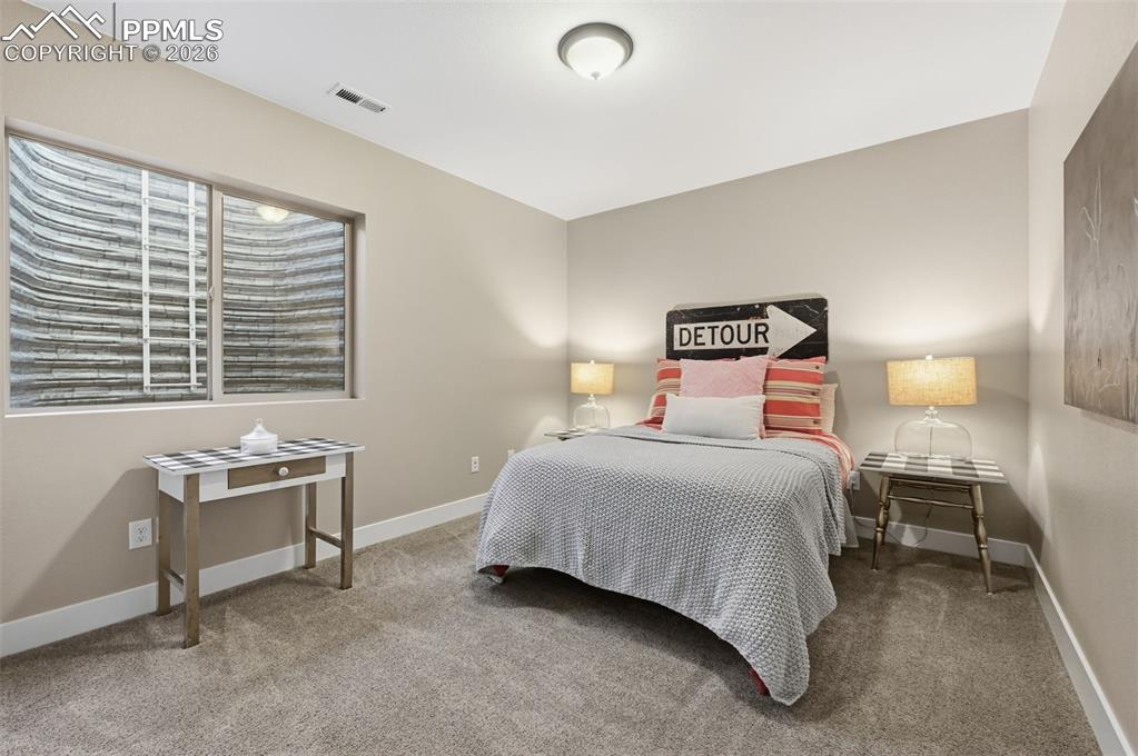 Image 30 of 40: Third bedroom in the basement! is a junior master!