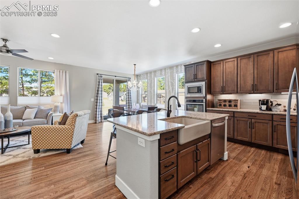 Image 6 of 40: Open floor plan and upgraded kitchen!