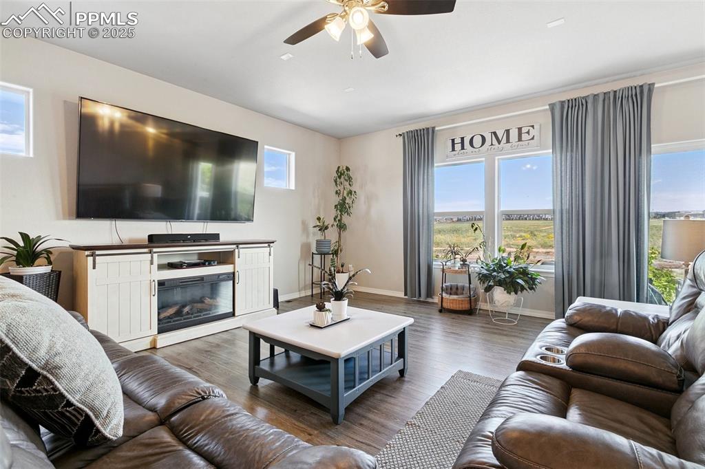 Image 13 of 50: Entertain in the spacious living room wired for surround sound