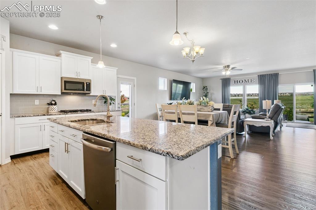 Image 6 of 50: Create wonderful meals in the gourmet kitchen featuring a double oven, inse