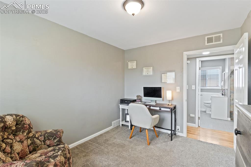 Image 20 of 34: 2ND BEDROOM ACROSS FROM HALL BATHROOM