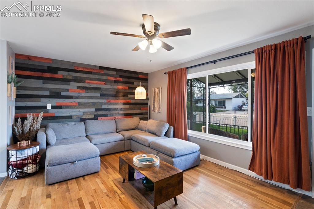 Image 4 of 34: LIVING ROOM WITH LARGE FRONT WINDOW