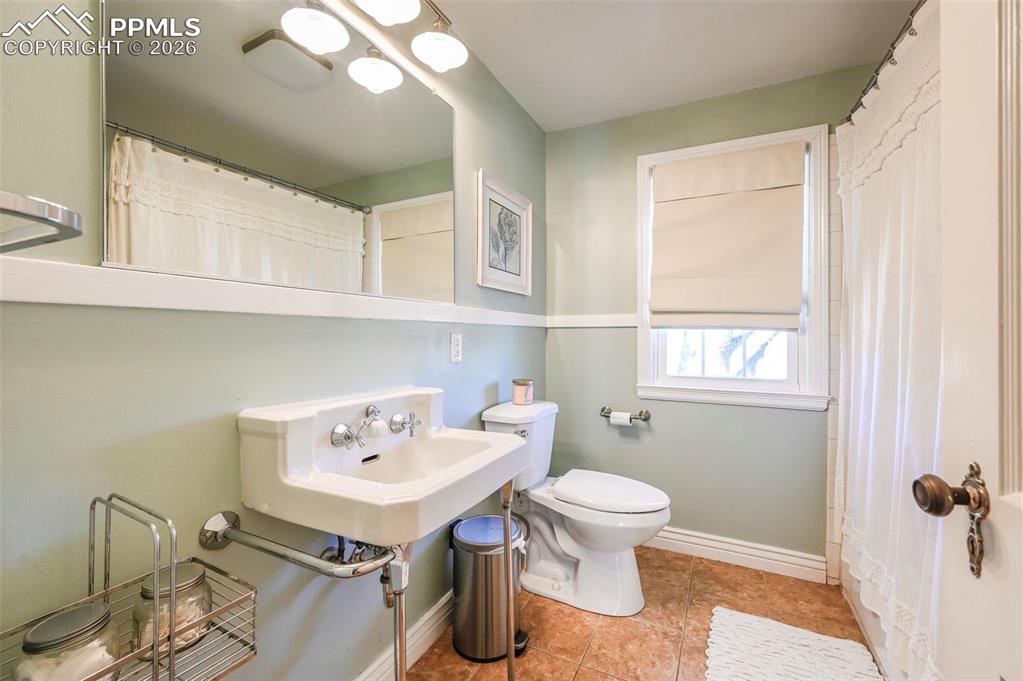 Image 13 of 48: Full bath upstairs