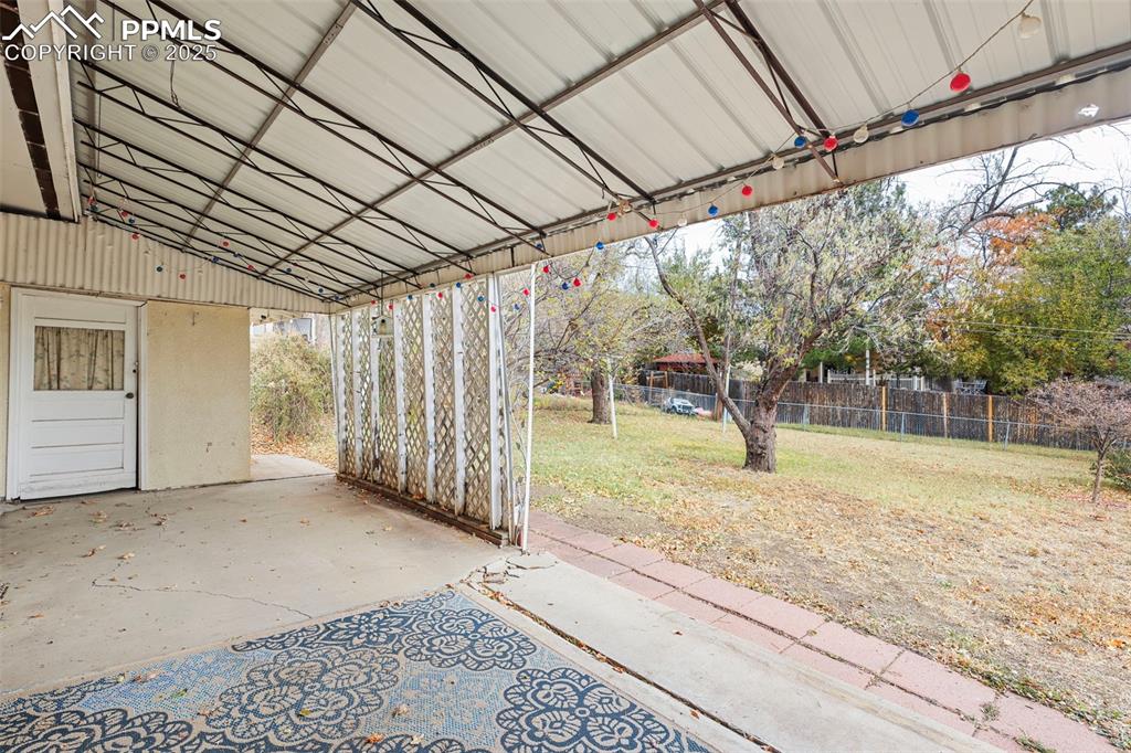 Image 27 of 35: Covered rear patio