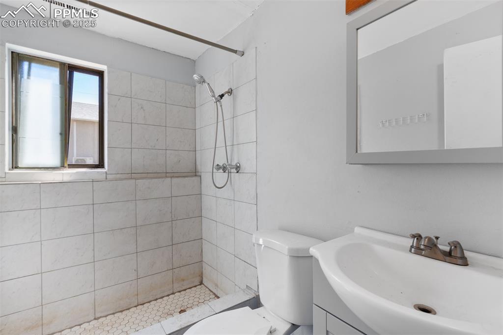 Image 19 of 36: 3/4 bathroom lower