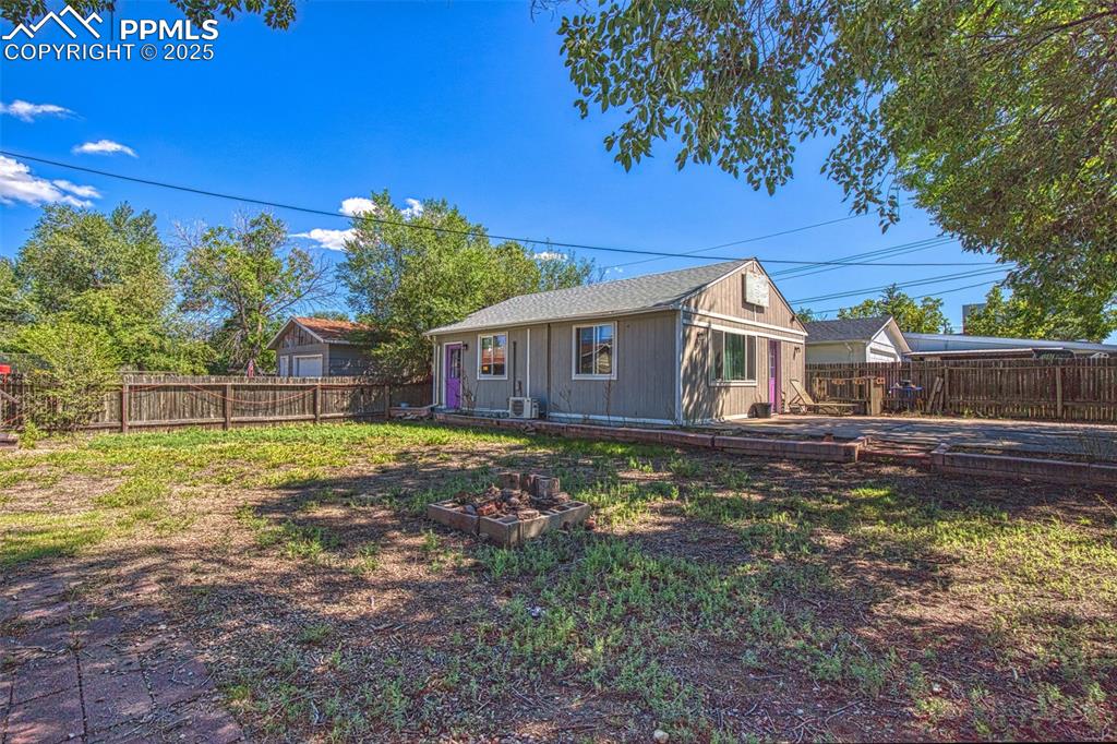 Image 30 of 36: Yard between ADU and house