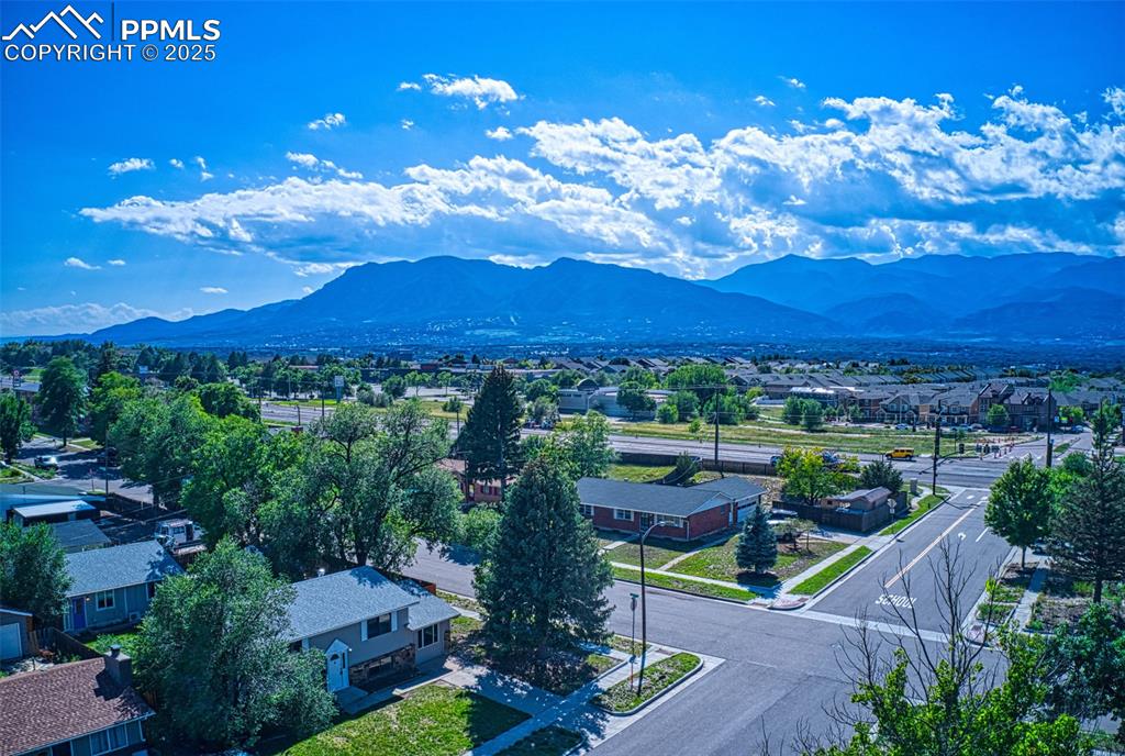Image 35 of 36: View of mountain background with nearby suburban area
