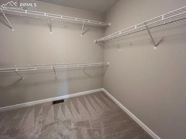 Image 13 of 15: Primary bedroom closet
