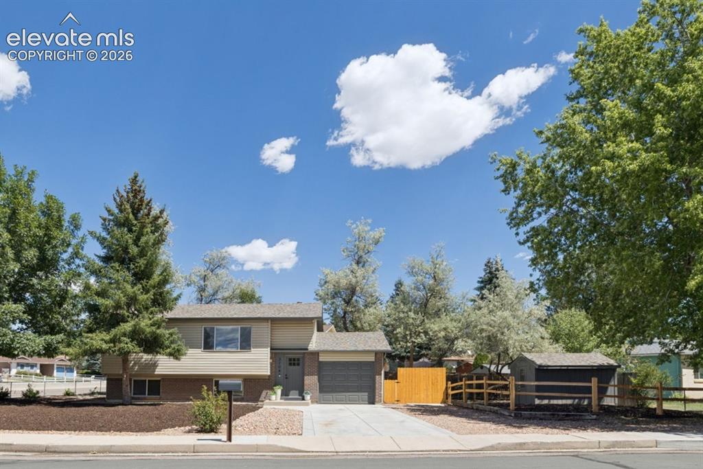 Image 42 of 42: Extra-wide lot with large trees! 