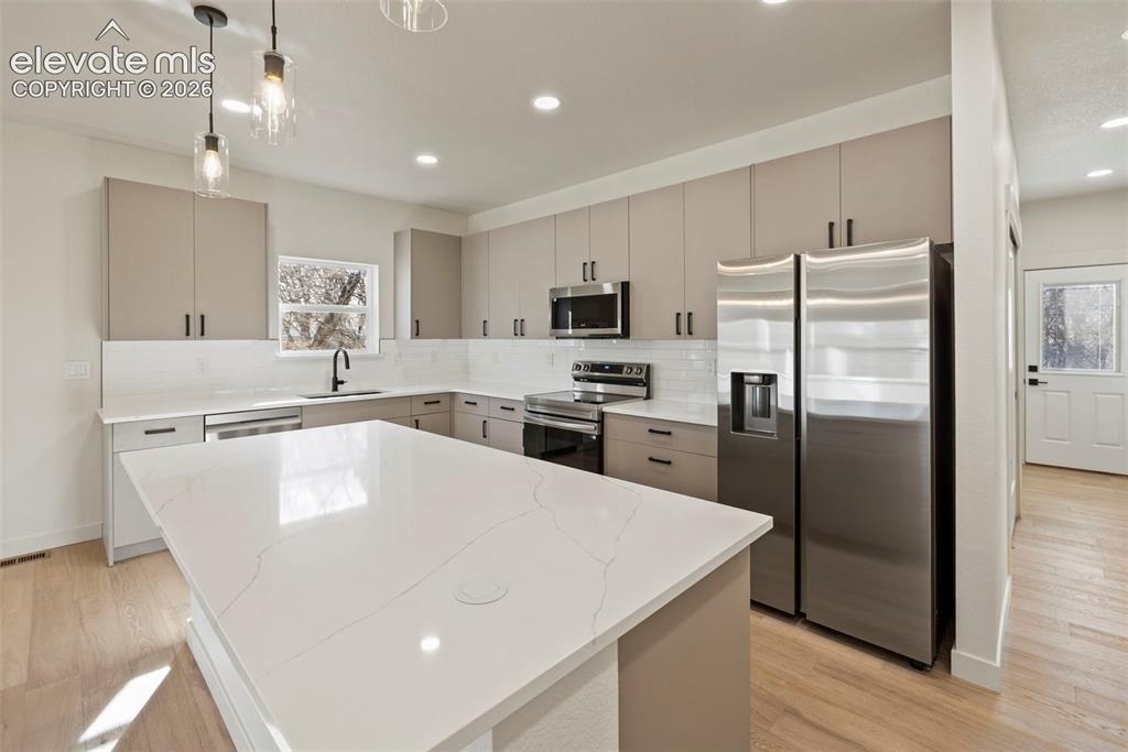 Image 10 of 32: Image is of a previously built home.