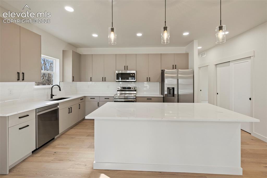 Image 11 of 32: Image is of a previously built home.