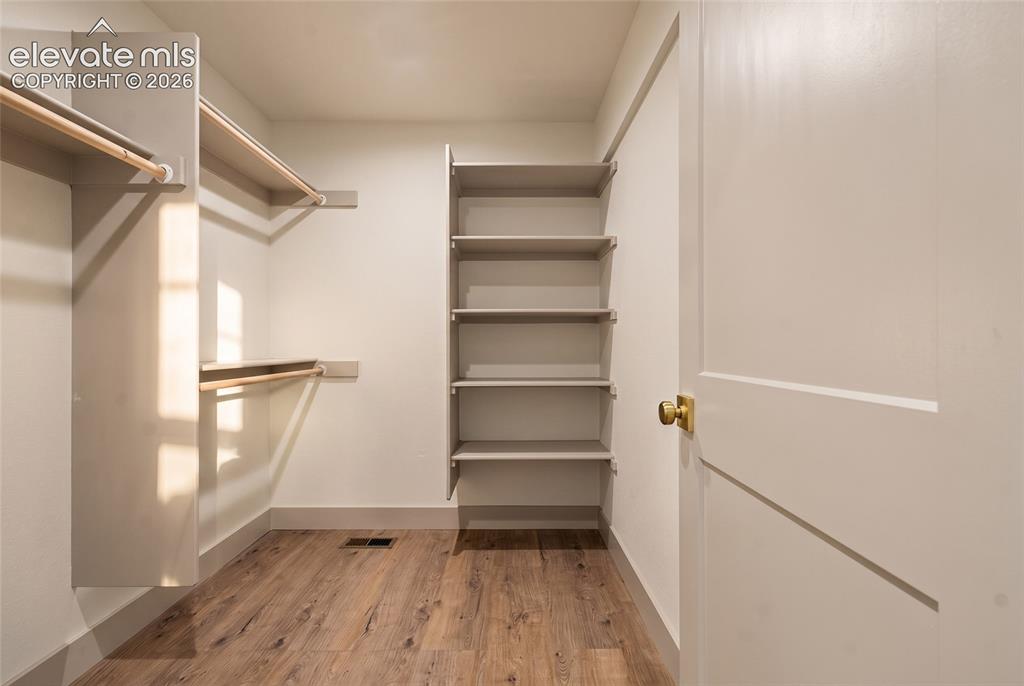 Image 16 of 42: Spacious Primary Closet
