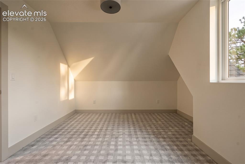 Image 18 of 42: Upper Level Bedroom