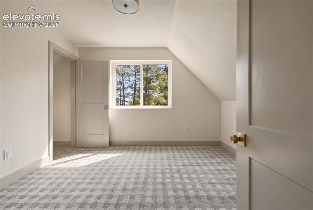 Image 22 of 42: Upper Level Bedroom