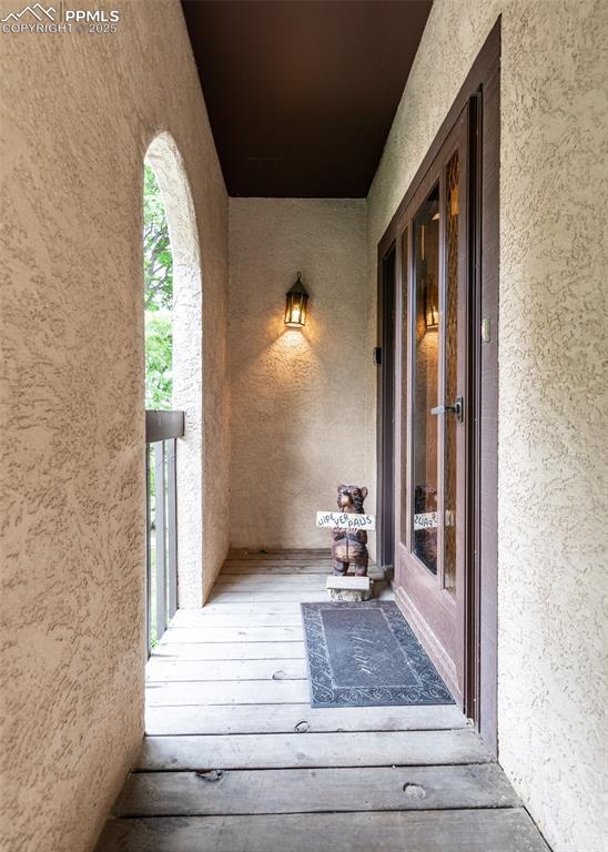 Image 10 of 37: Top of Staircase entry into the front door