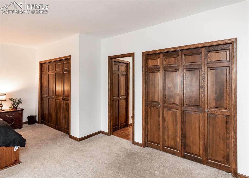 Image 28 of 37: Master bedroom with lots of closets