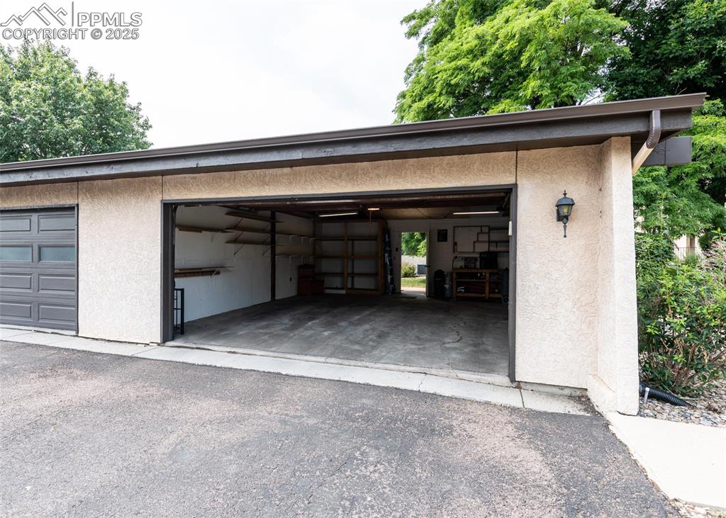 Image 7 of 37: View of garage on the end