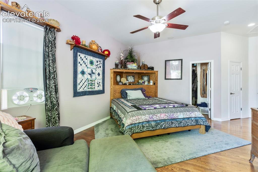 Image 13 of 28: Hardwood-style flooring throughout