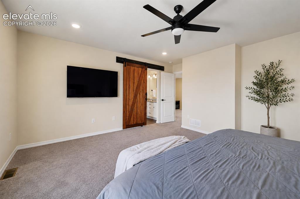 Image 15 of 28: Master Bedroom